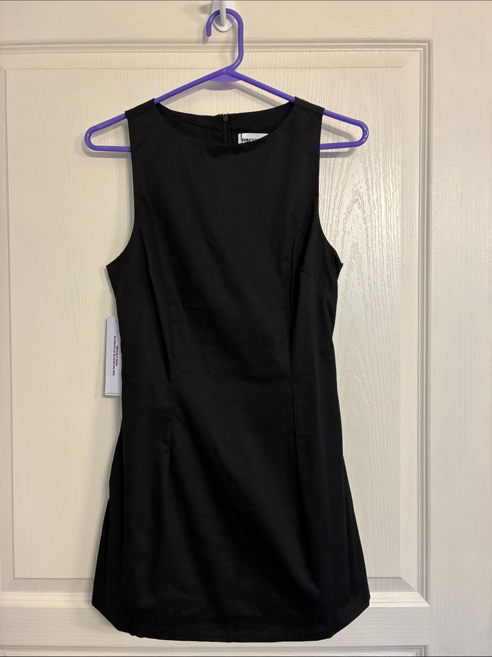 Sleek Black Sleeveless Mini Dress - Brand: